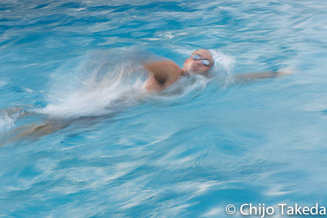 man swimming in pool in Hawaii
